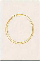 A fine saffron circle on warm paper